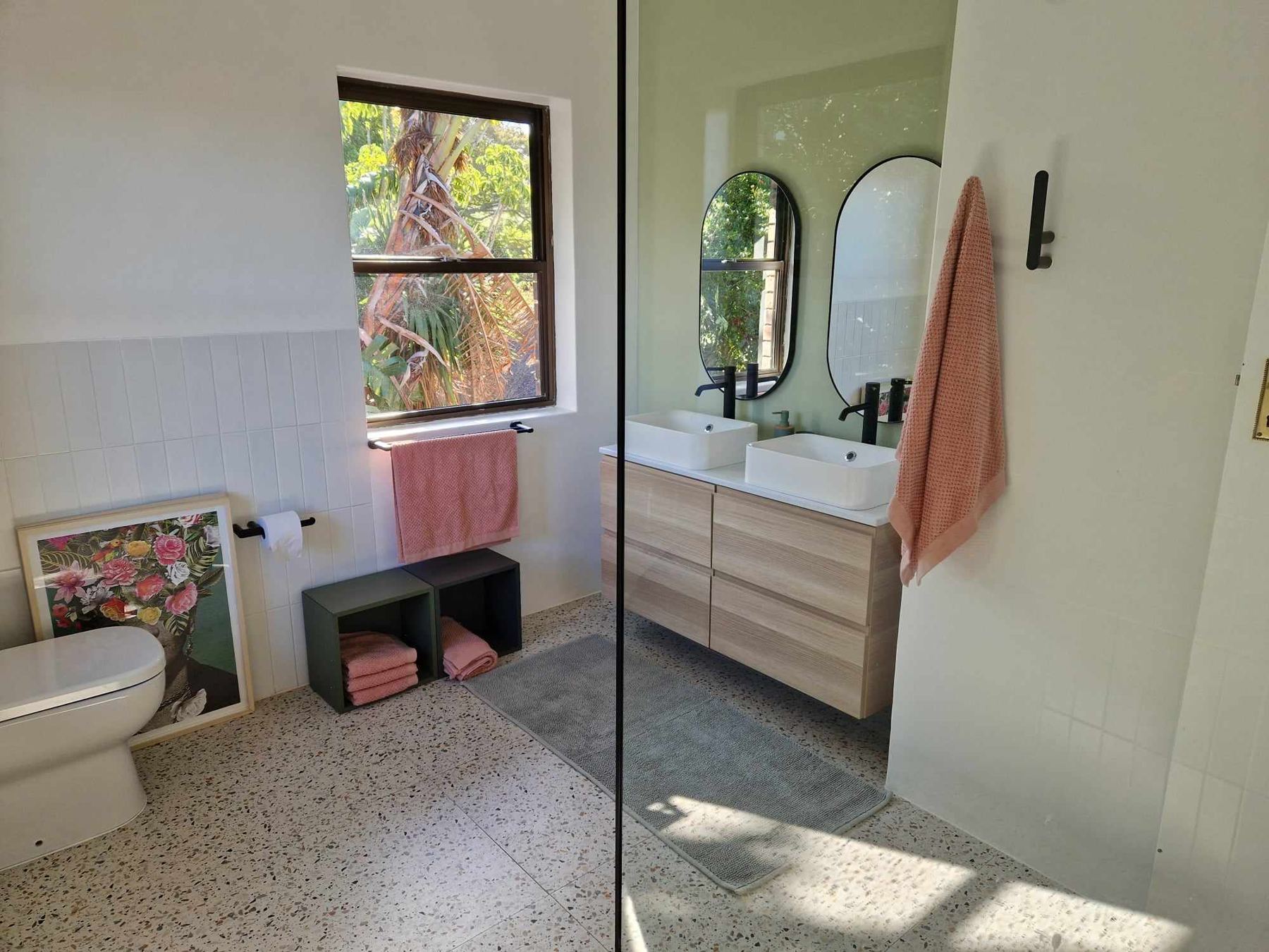 Upstairs bathroom with a twin basin vanity